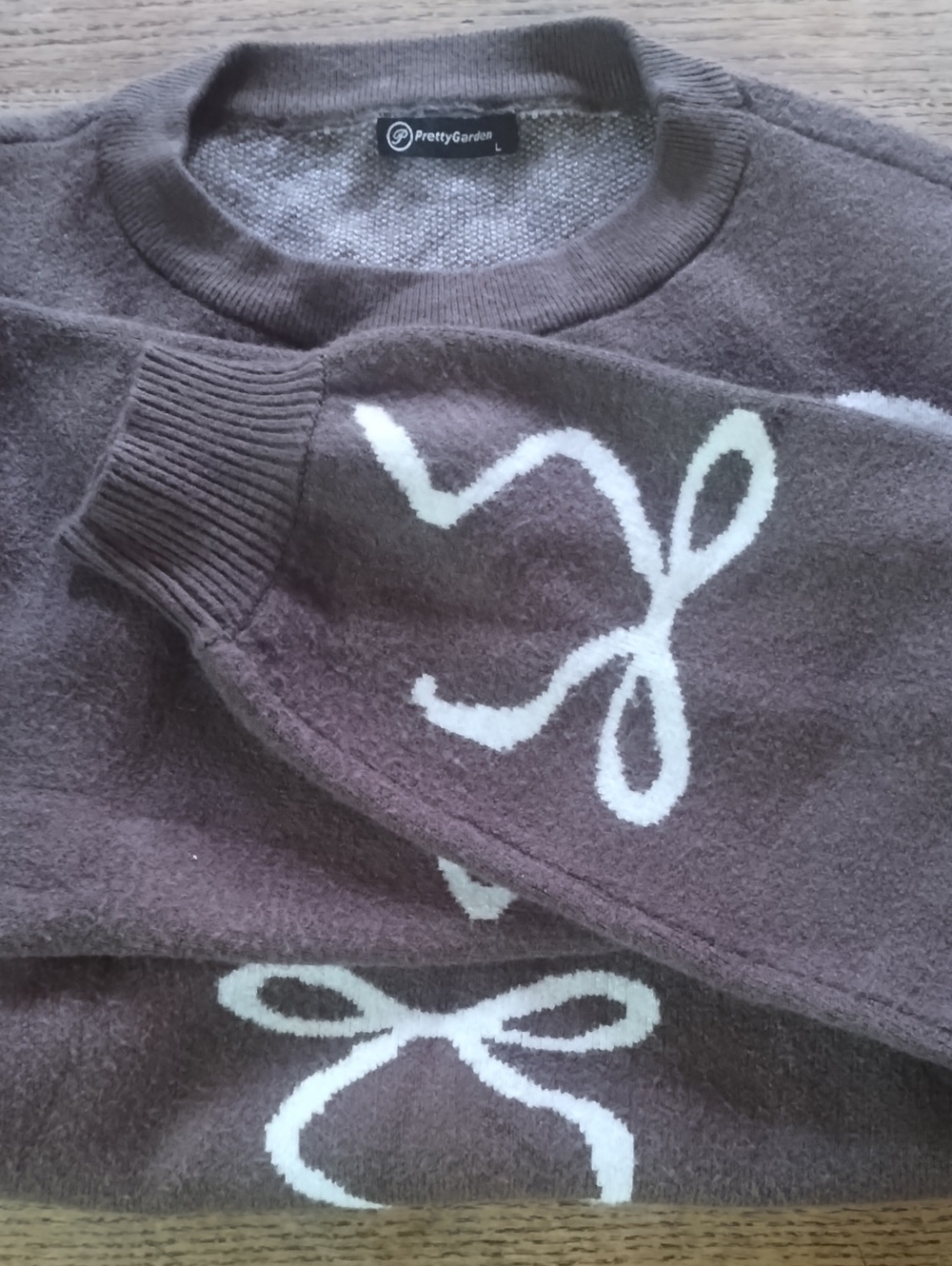 Women's Brown Crewneck Sweater with White Bow Motif